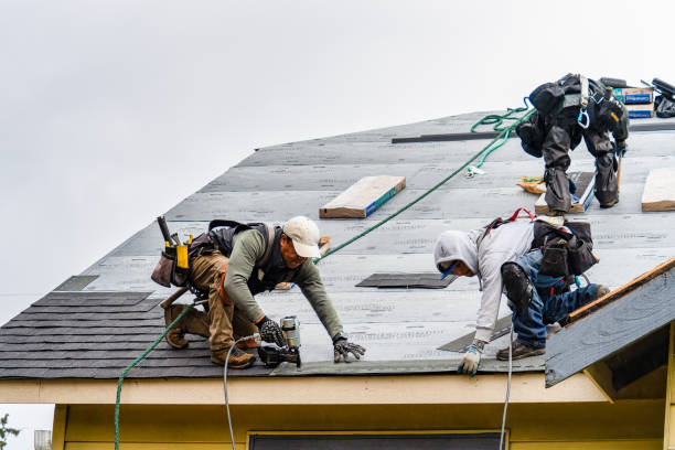 Professional Roofing technician working in Revere, MA